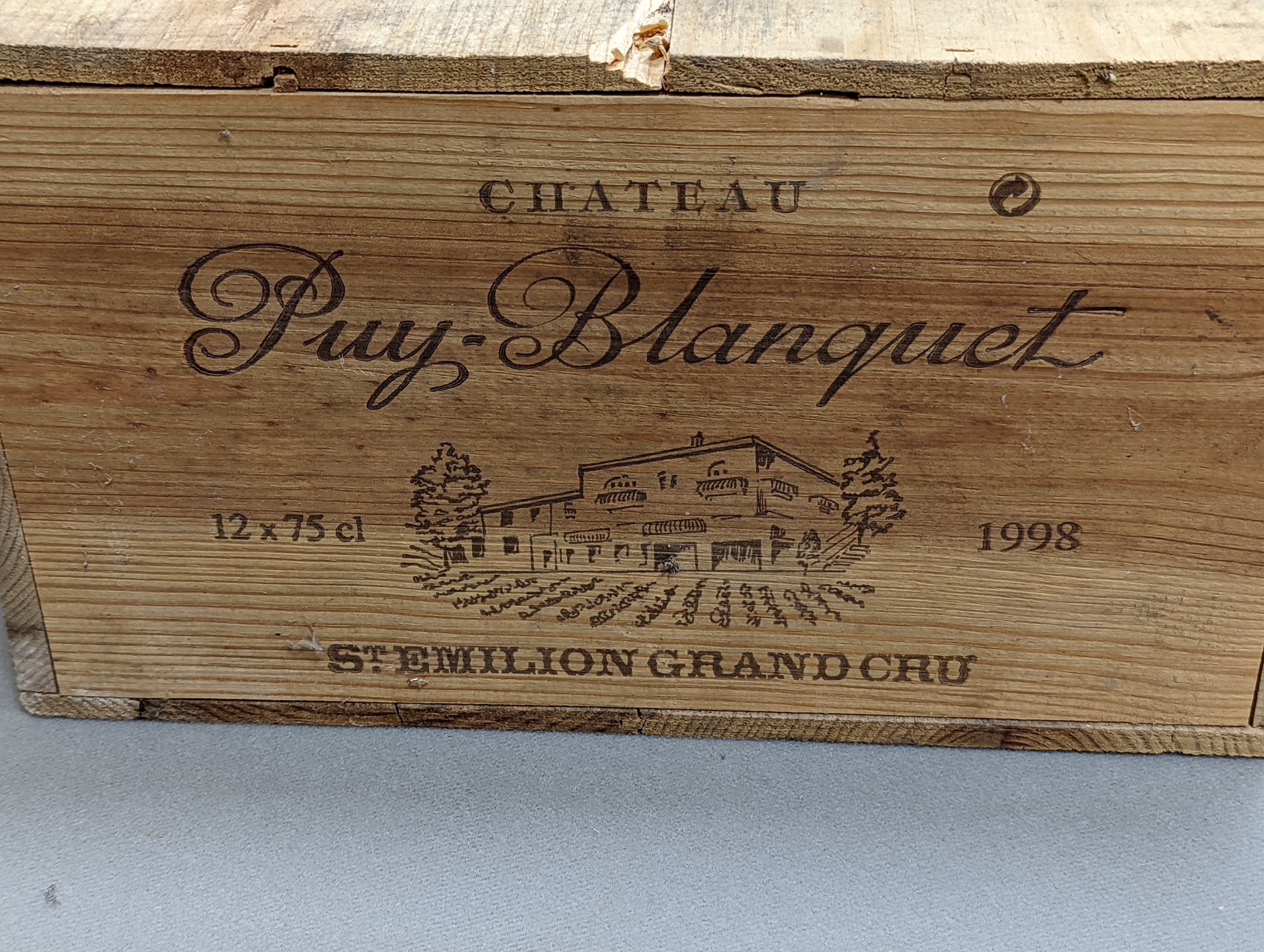 A case of 12 bottles of Chateau Puy Blanquet, 1998, in OWC.